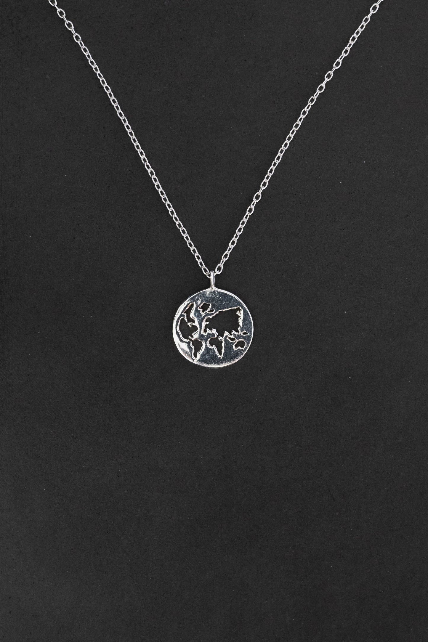 World Map Cutout Pendant