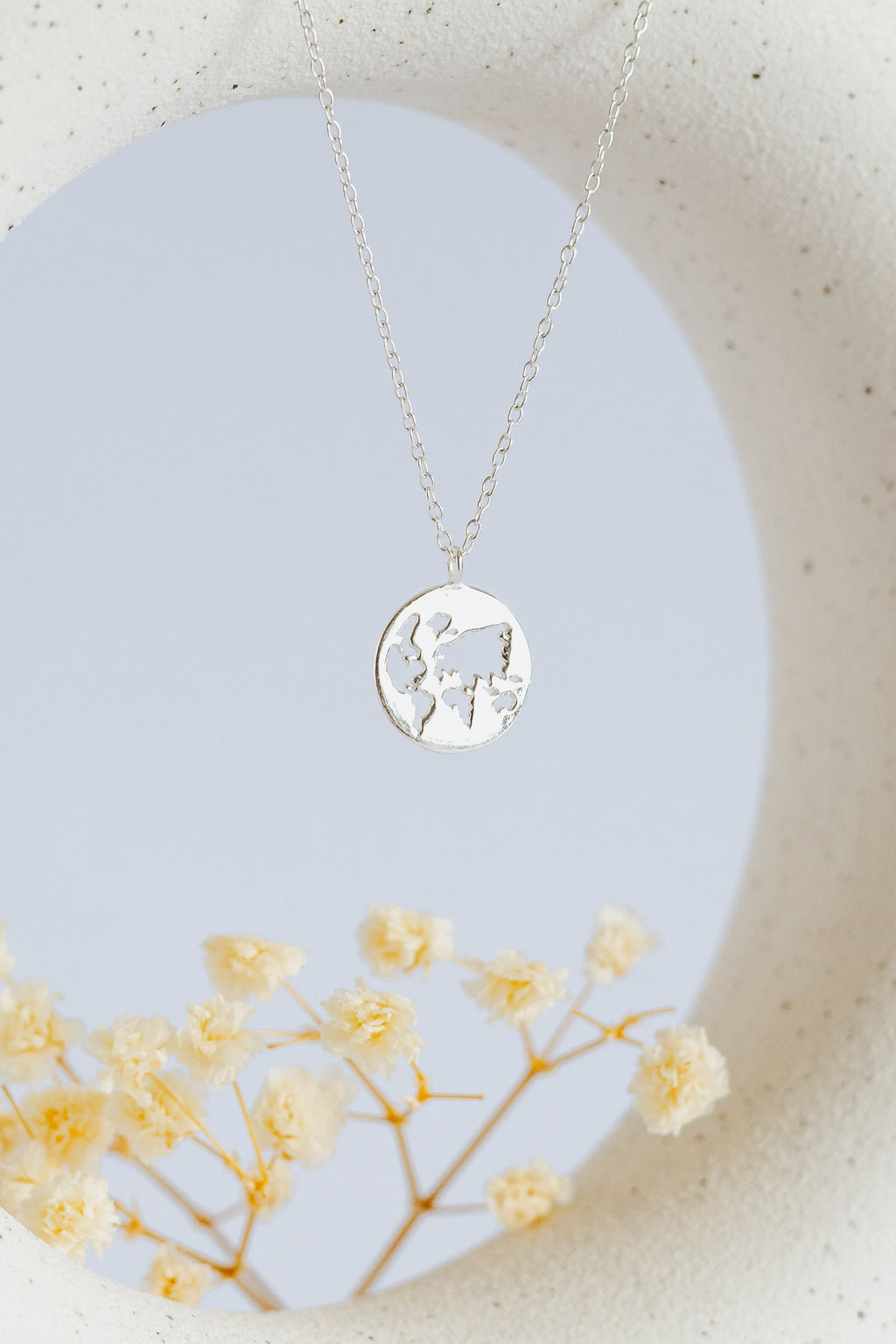 World Map Cutout Pendant