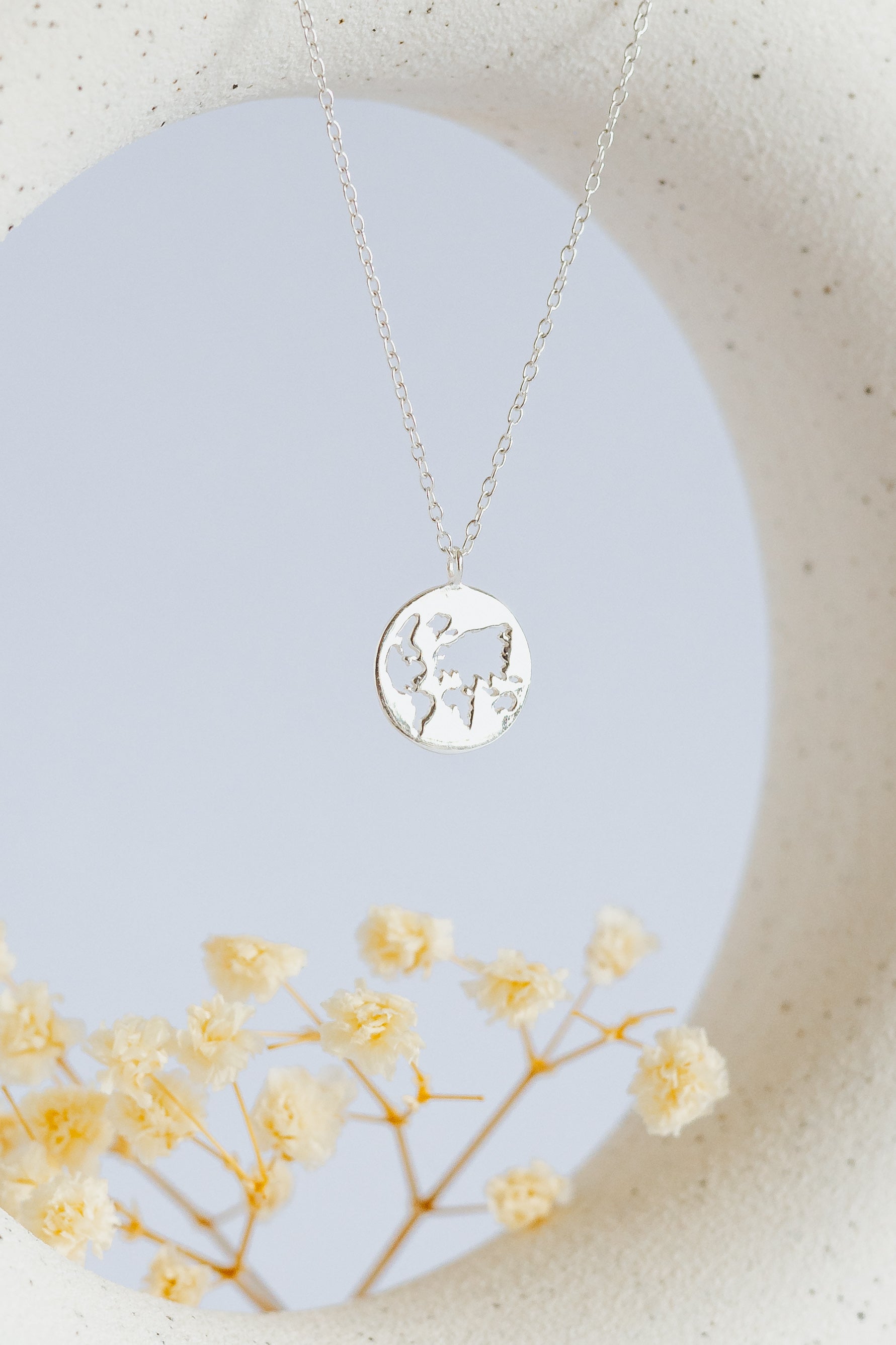 World Map Cutout Pendant