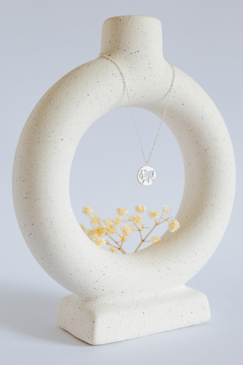 World Map Cutout Pendant