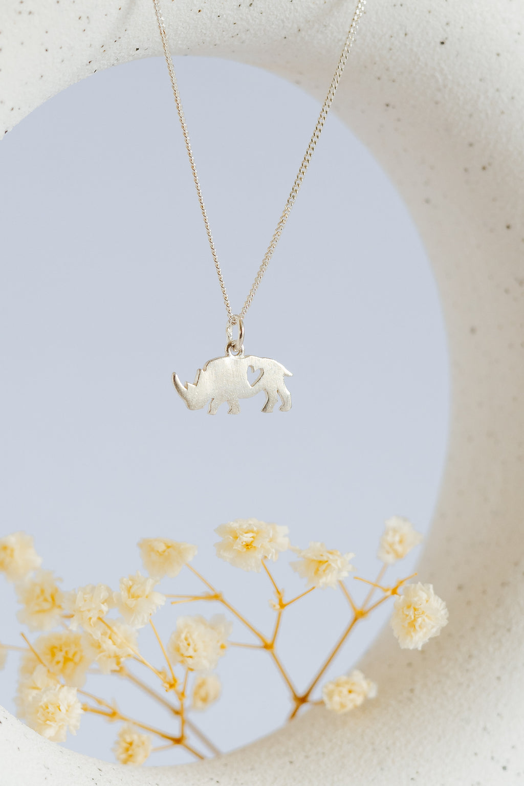 Rhino Pendant with Heart Cutout