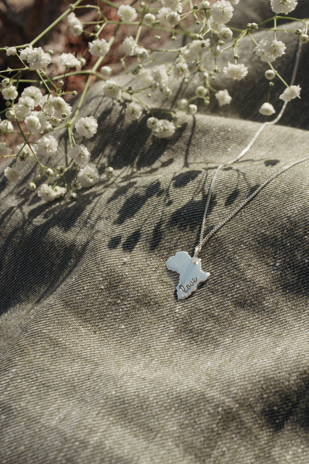 Solid Africa Map Pendant with "Love" Engraved