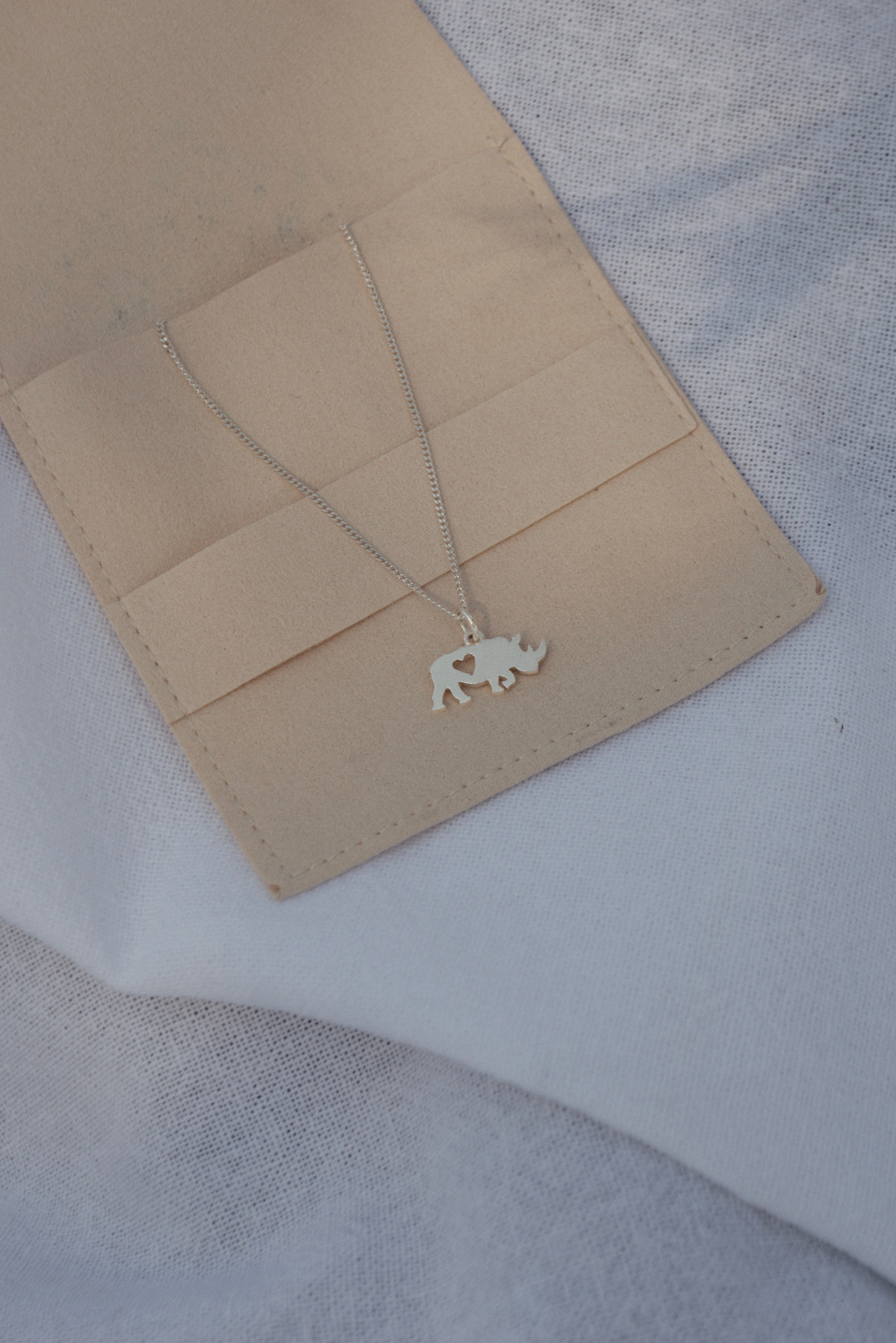 Rhino Pendant with Heart Cutout